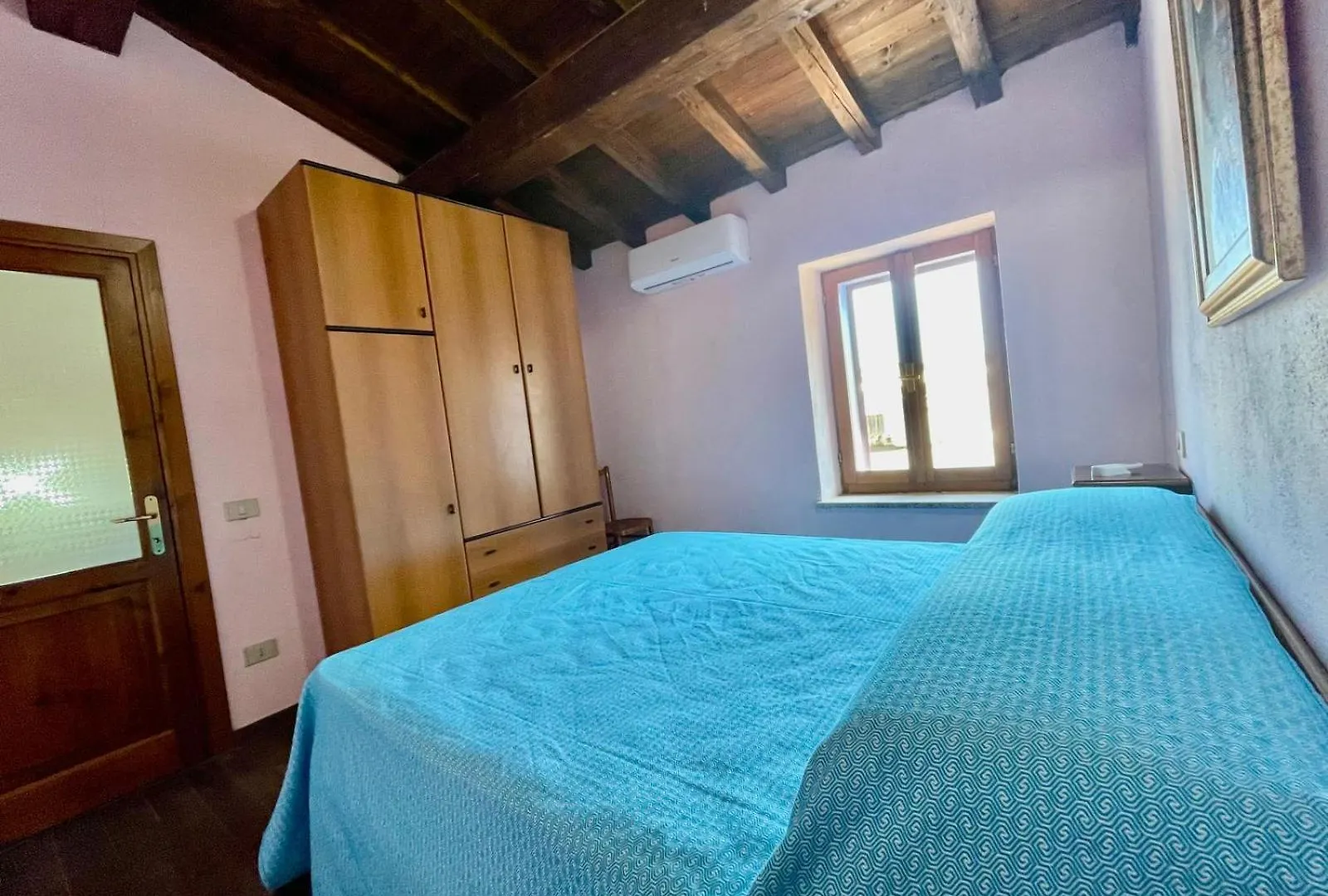 Casa vacanze Villa Nel Cortile Della Casa Di Carta, Due Singole Unita Torpè Italia